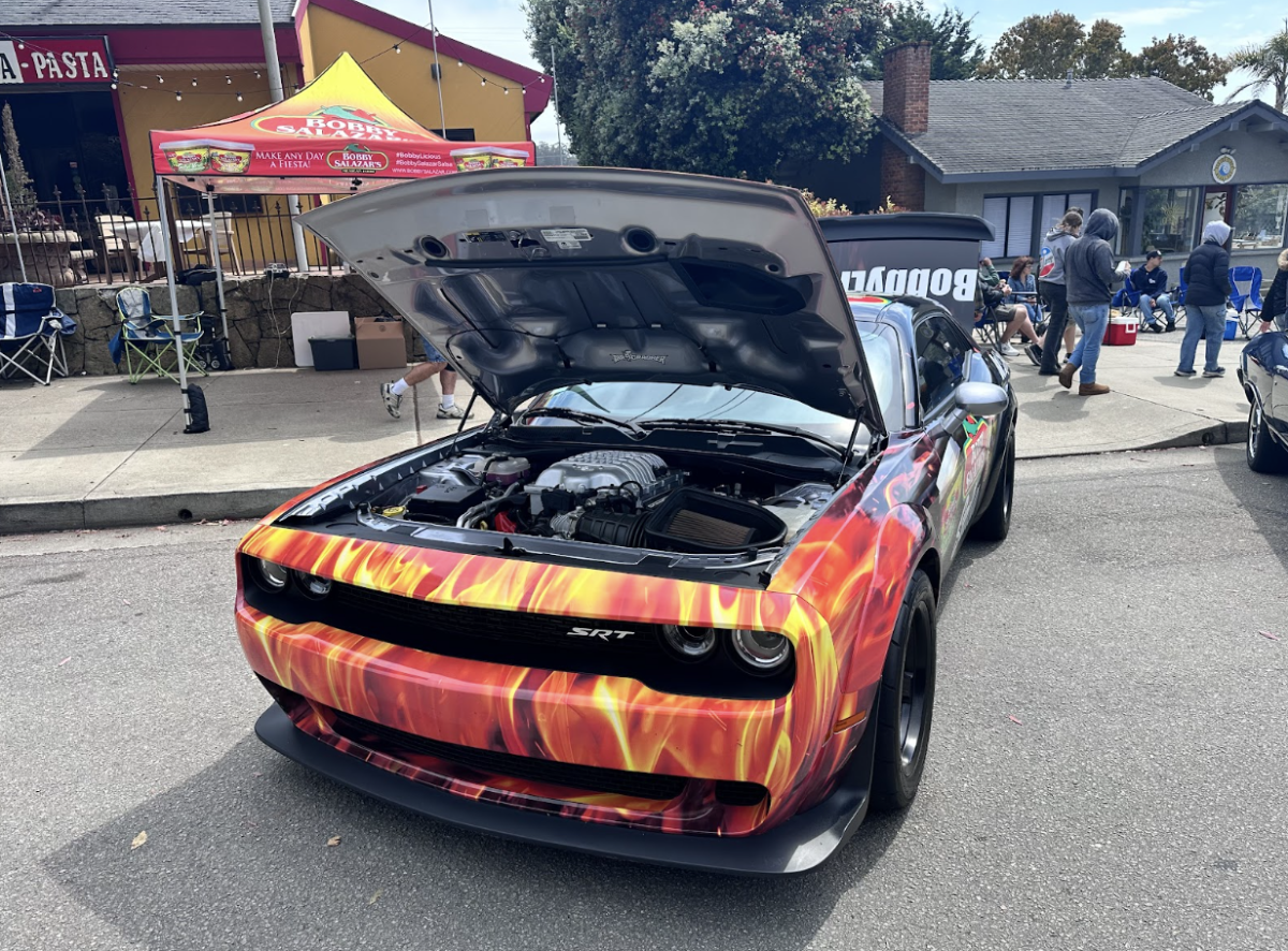 Bobby Salazar's salsa at Show n Shine 2025 with the fiery hot Dodge Challenger SRT Hellcat and a free sample station to sample salsa at Morro Bay Car Show 2025.
